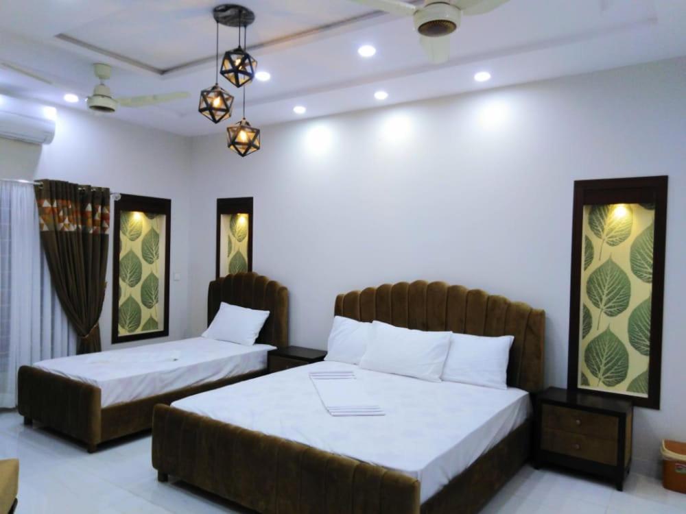 Islamabad Travelodge Guest House Kamer foto
